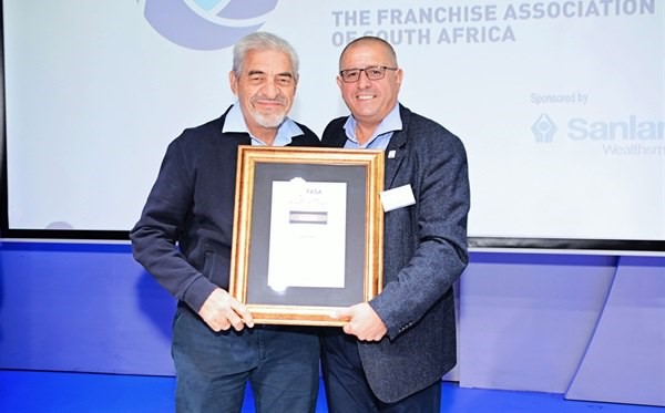 Fasa bestowed the prestigious Hall of Fame award to Ian Fuhr (left), entrepreneur and founder of the Sorbet brand of grooming stores.